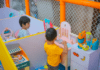Which Toys Will Benefit Your Child’s Development? Two children at pretend play stations